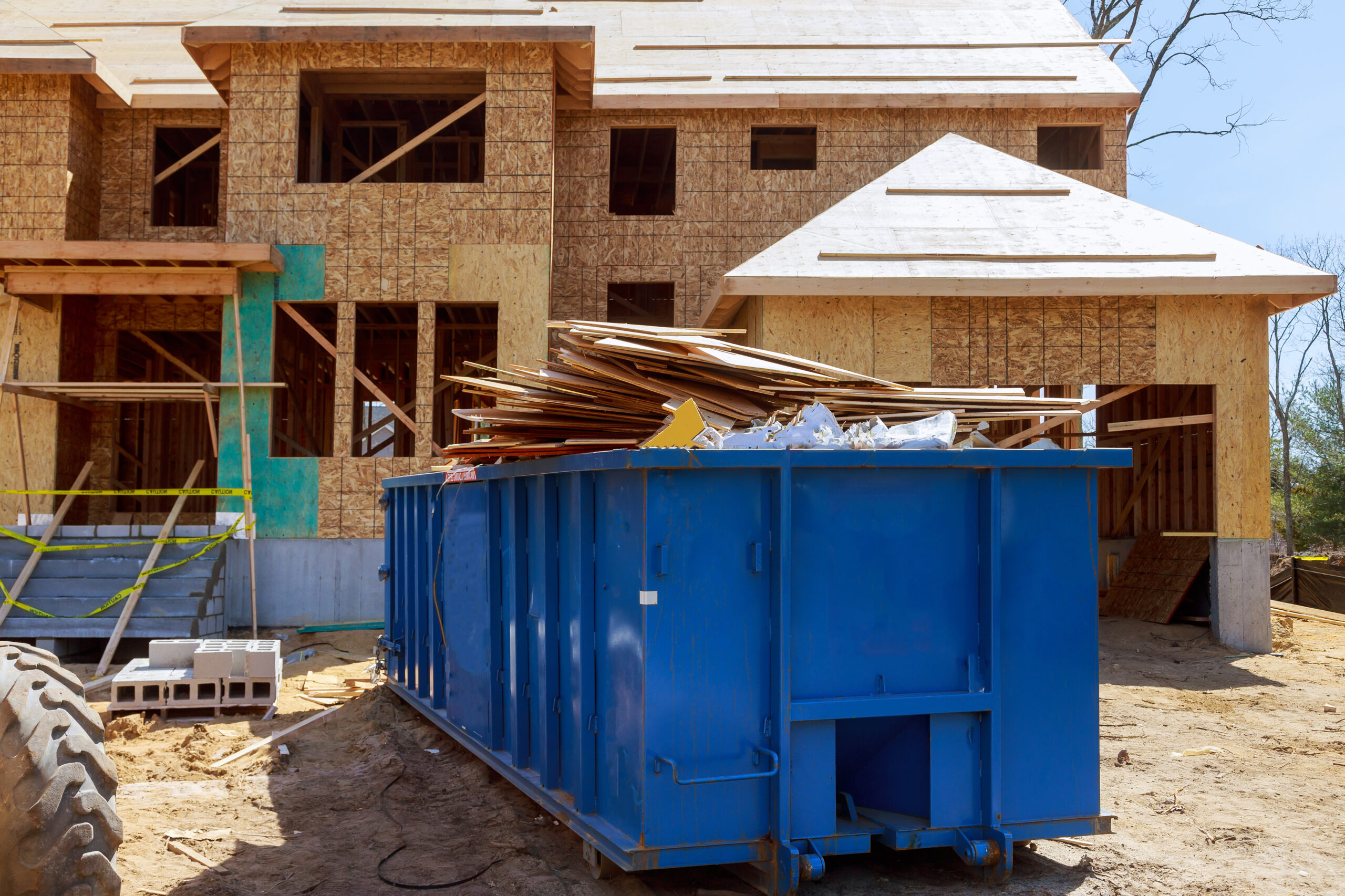 CONSTRUCTION DUMPSTER filled with construction debris